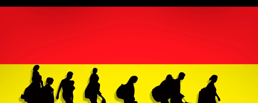 Flüchtlinge Symboldbild vor Deutschlandfarben